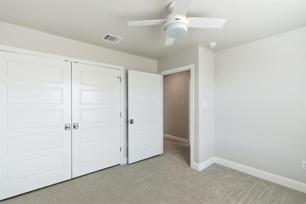 4600 A Old Brock Road Weatherford, TX 76087 - Photo 34 of 40 Unfurnished bedroom with light carpet, a closet, and a ceiling fan