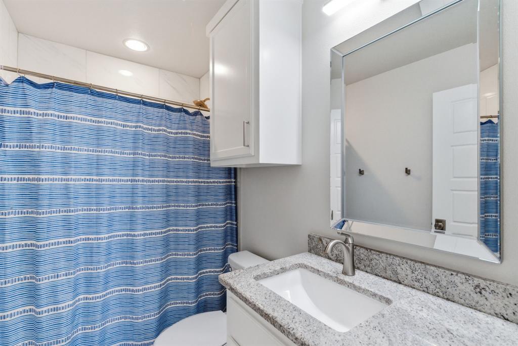 4600 A Old Brock Road Weatherford, TX 76087 - Photo 35 of 40 Full bathroom featuring vanity, a shower with curtain, and recessed lighting