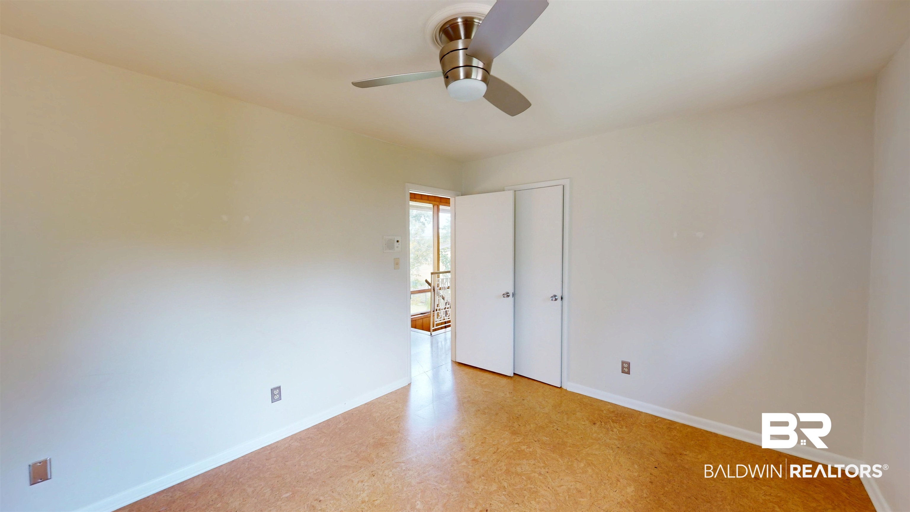 15 Spring Bank Road Mobile, AL 36608 - Photo 38 of 58 Unfurnished bedroom featuring ceiling fan and a closet