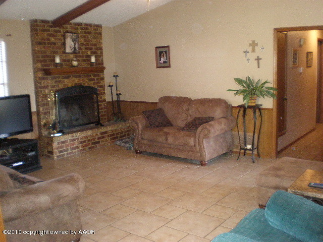 6213 Rutgers Street Amarillo, TX 79109 - Photo 4 of 15 Living Room w/wood burning fireplace