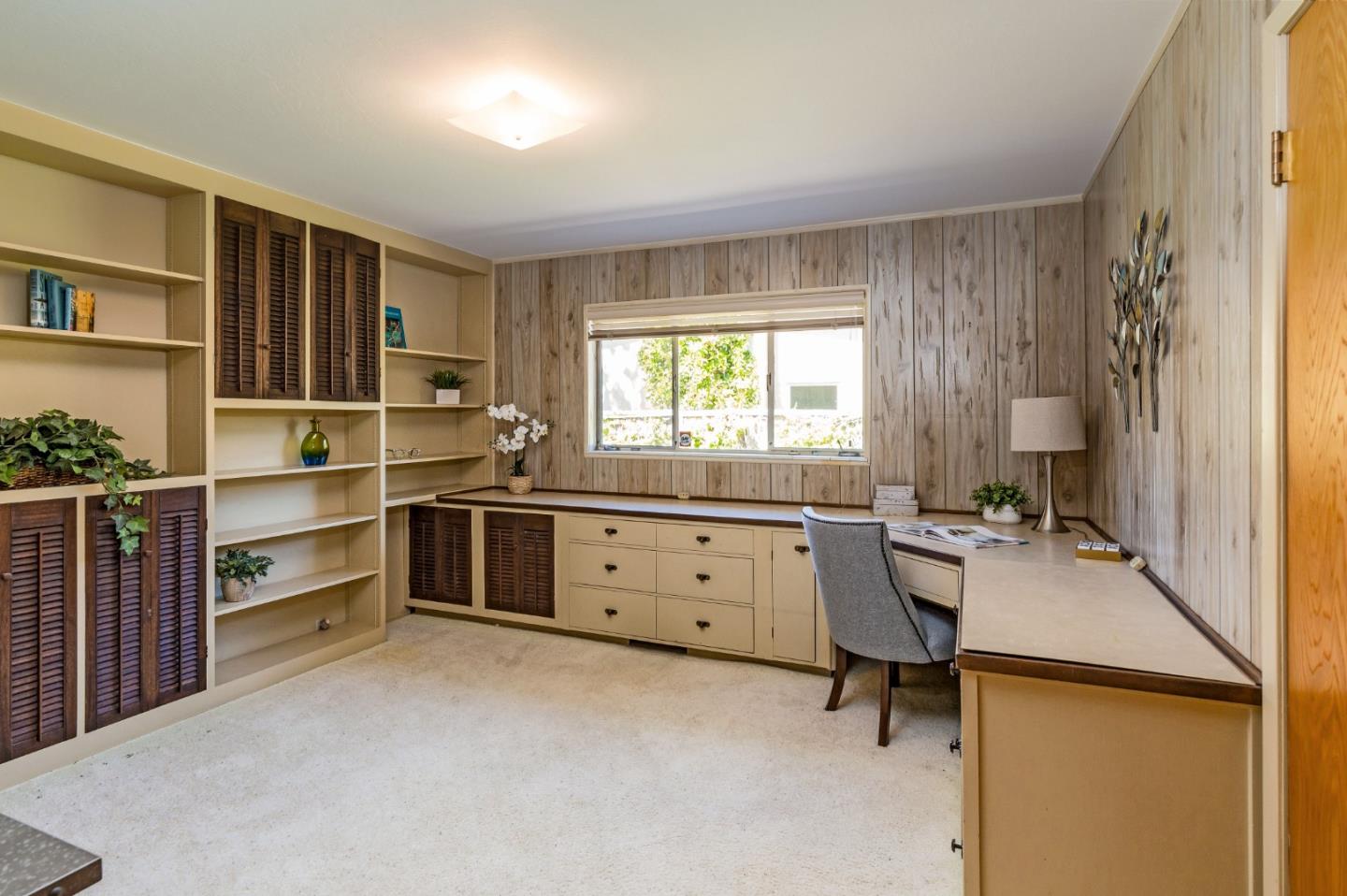 20184 Pierce Road Saratoga, CA 95070 - Photo 14 of 30 a room with furniture a window and a dresser