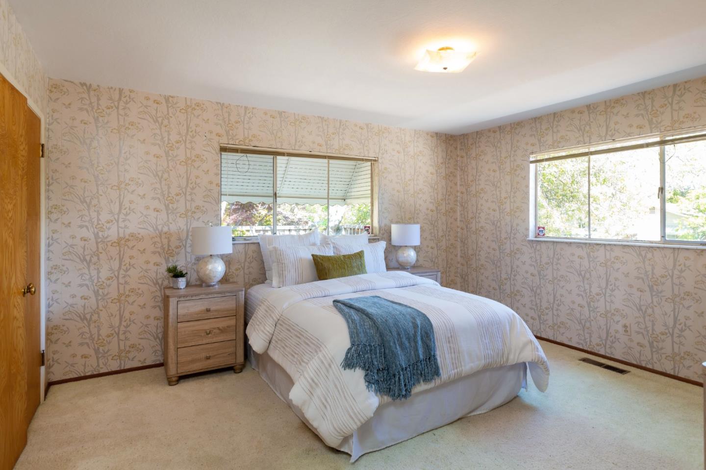 20184 Pierce Road Saratoga, CA 95070 - Photo 16 of 30 a bedroom with a bed and window