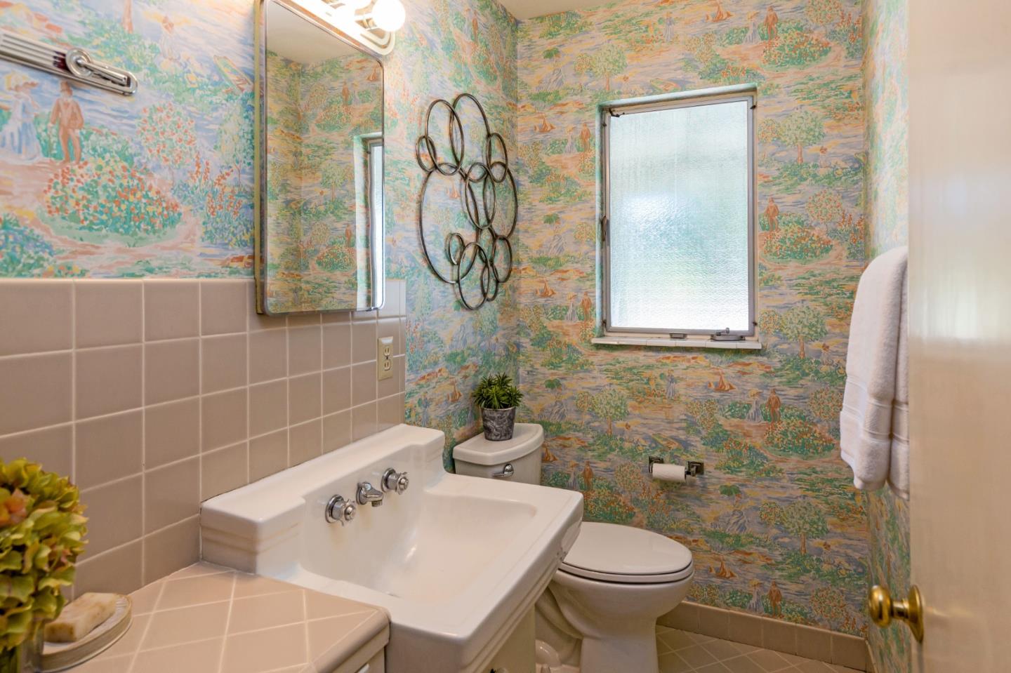 20184 Pierce Road Saratoga, CA 95070 - Photo 17 of 30 a bathroom with a sink toilet and shower