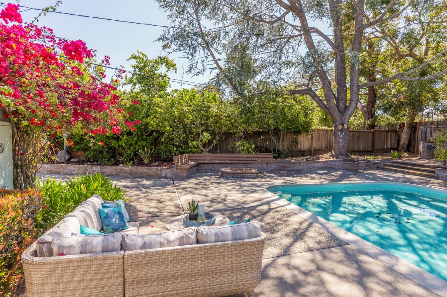 20184 Pierce Road Saratoga, CA 95070 - Photo 25 of 30 a view of a bench in the garden