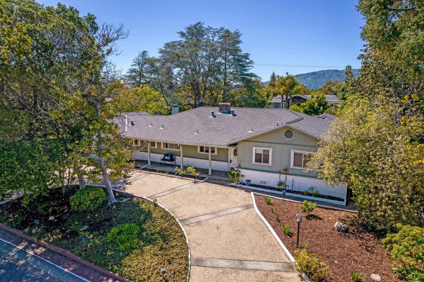 20184 Pierce Road Saratoga, CA 95070 - Photo 27 of 30 a view of a house with a backyard