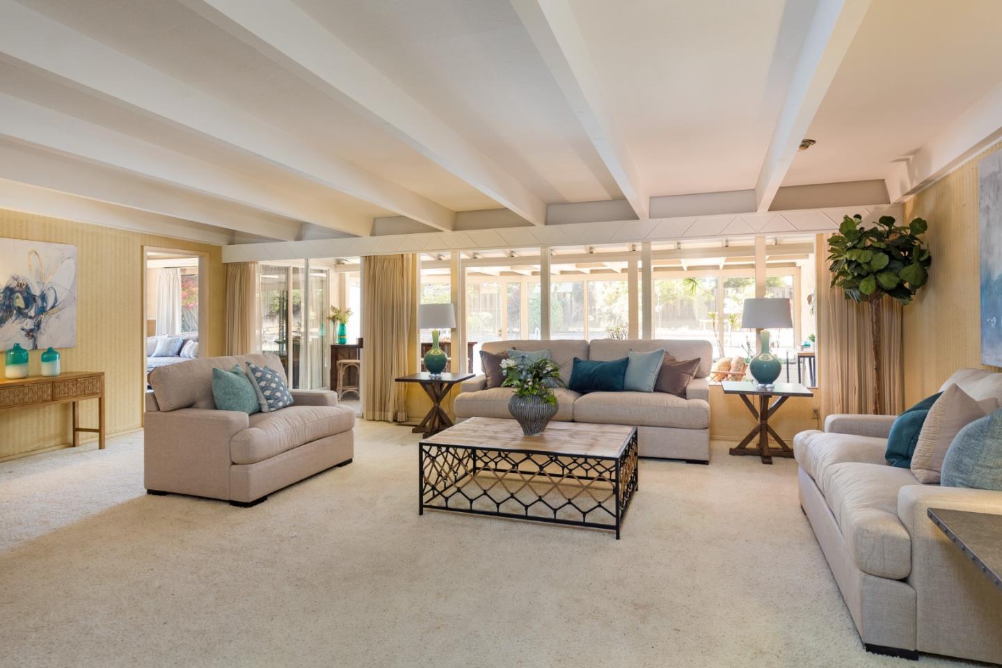 20184 Pierce Road Saratoga, CA 95070 - Photo 5 of 30 a living room with furniture and a large window