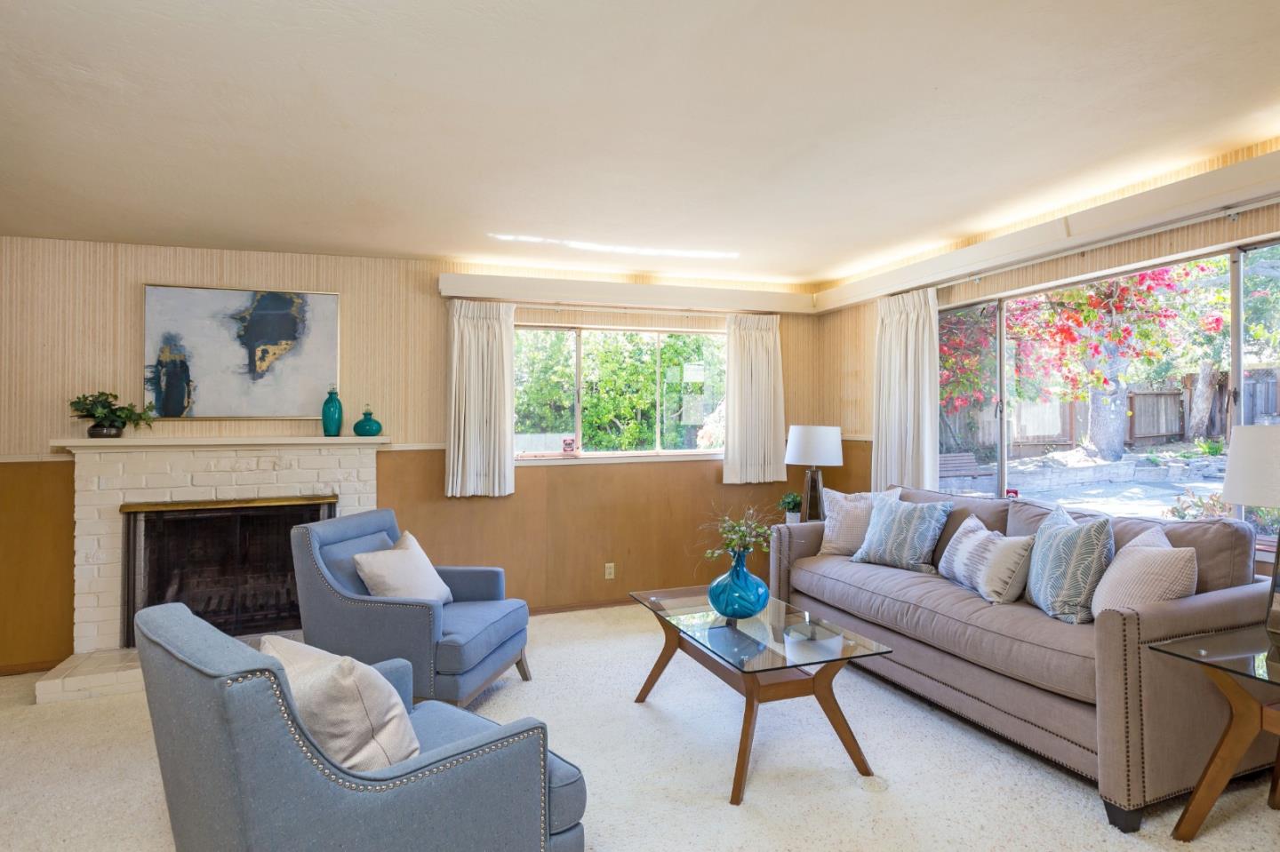 20184 Pierce Road Saratoga, CA 95070 - Photo 7 of 30 a living room with furniture and a fireplace