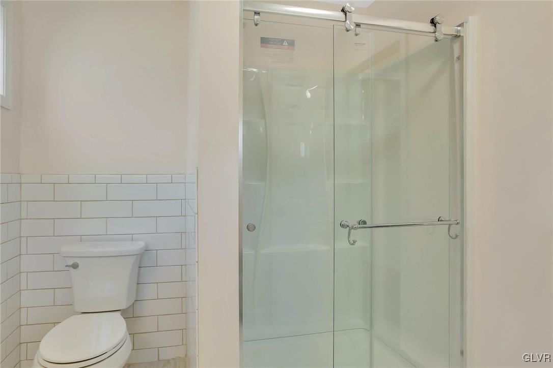 111 Brewster Way East Stroudsburg, PA 18301 - Photo 13 of 30 a bathroom with a toilet and a shower