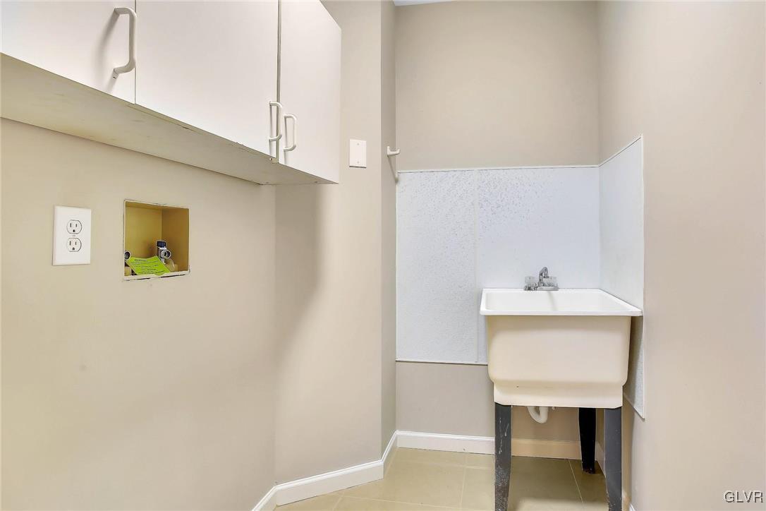 111 Brewster Way East Stroudsburg, PA 18301 - Photo 14 of 30 a bathroom with a sink a toilet and mirror