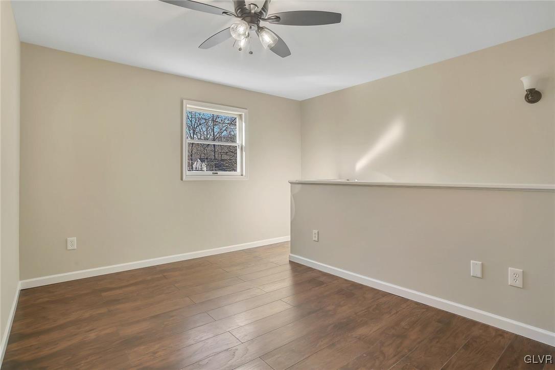 111 Brewster Way East Stroudsburg, PA 18301 - Photo 15 of 30 a view of an empty room with wooden floor