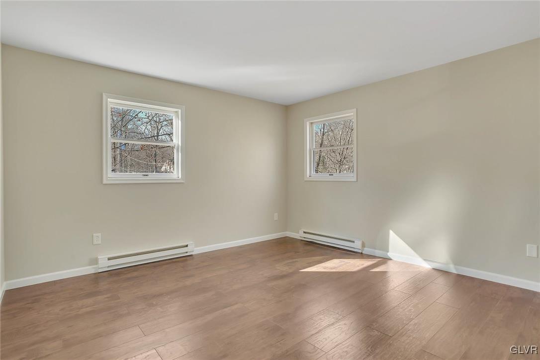 111 Brewster Way East Stroudsburg, PA 18301 - Photo 16 of 30 an empty room with a painting on the wall