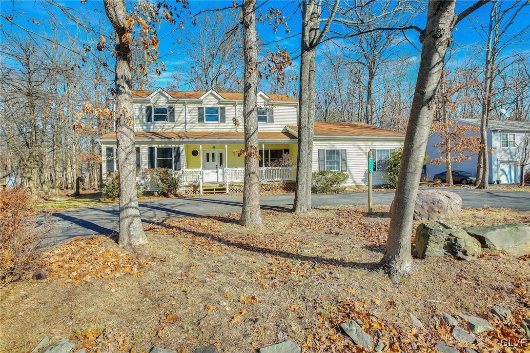 111 Brewster Way East Stroudsburg, PA 18301 - Photo 27 of 30 a view of a house with a yard in the background