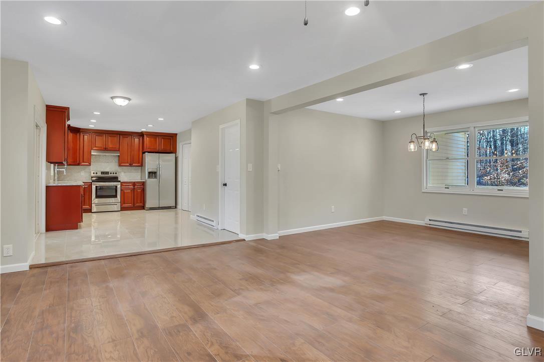 111 Brewster Way East Stroudsburg, PA 18301 - Photo 5 of 30 a view of a kitchen with a refrigerator and a window