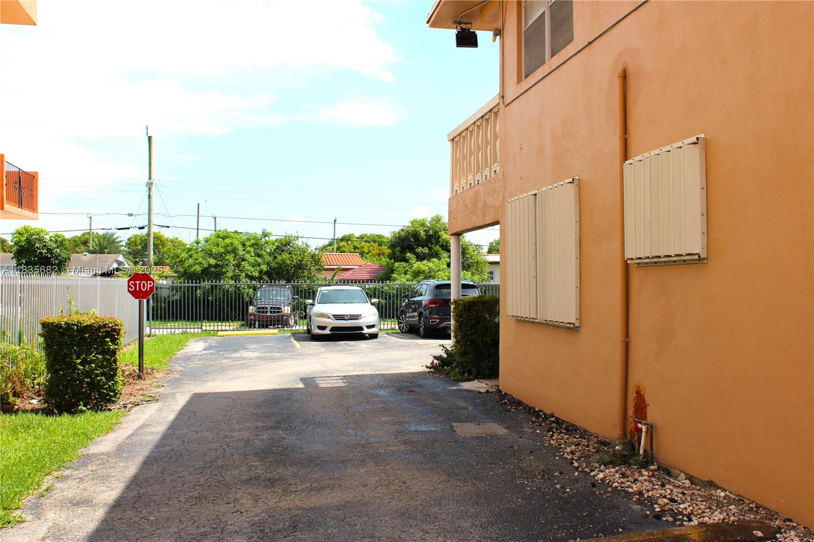 1154 West 35th Street, Unit 221 Hialeah, FL 33012 - Photo 12 of 39 a view of a street with cars on road