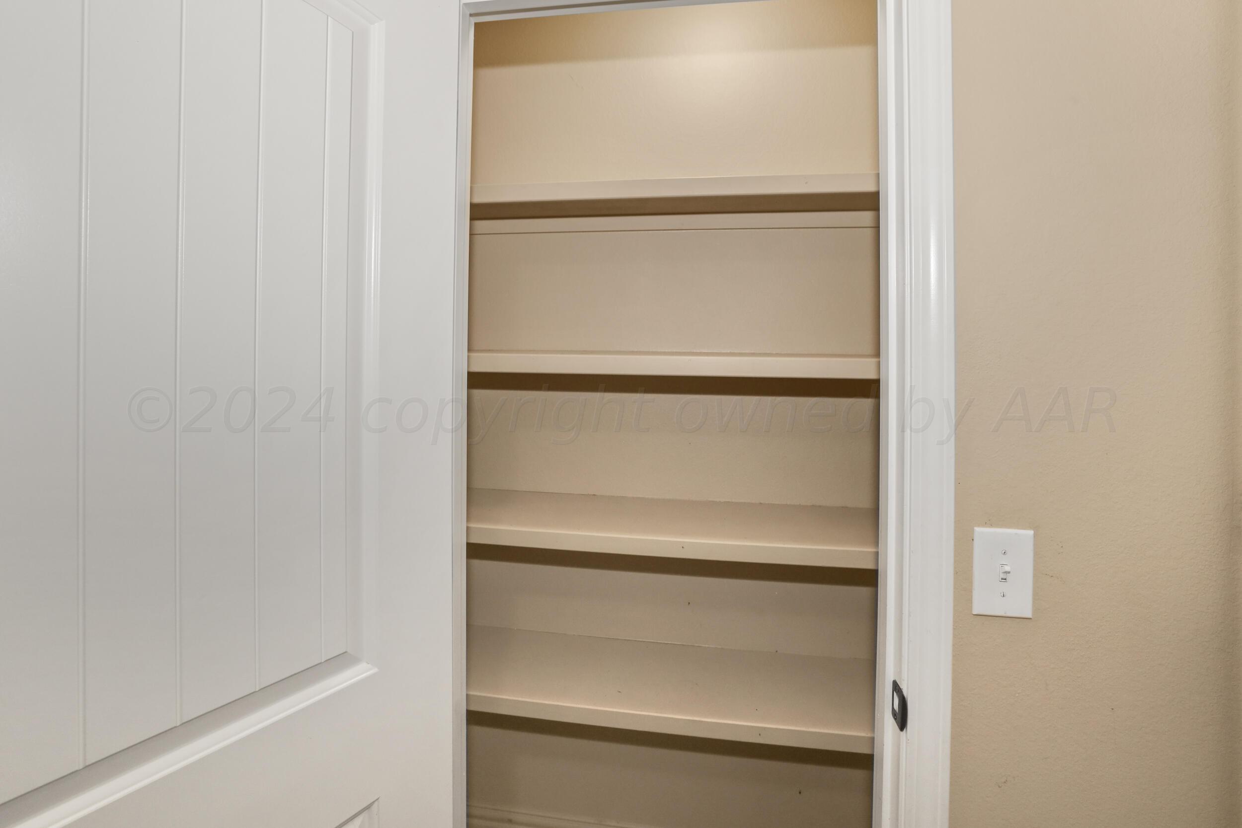 7303 Rochester Drive Amarillo, TX 79118 - Photo 16 of 38 a close view of closet
