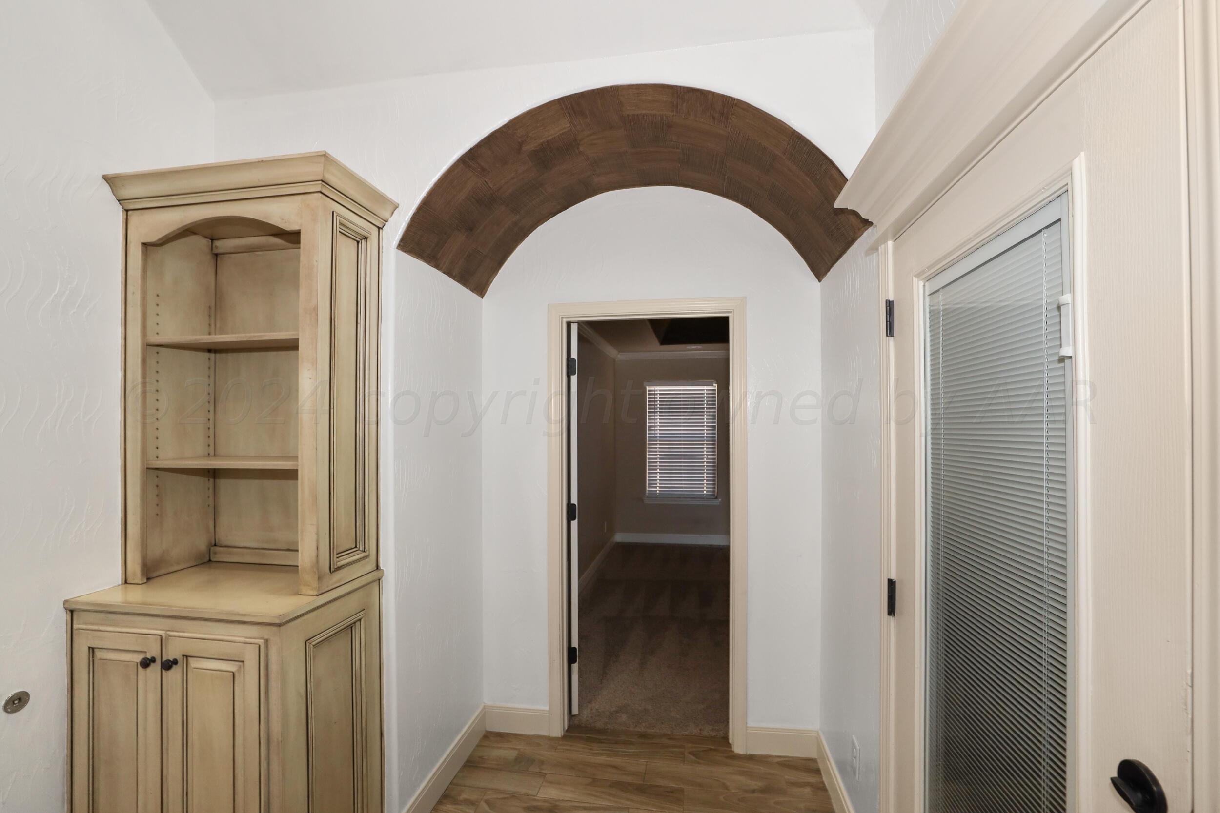 7303 Rochester Drive Amarillo, TX 79118 - Photo 29 of 38 a view of entryway with wooden floor