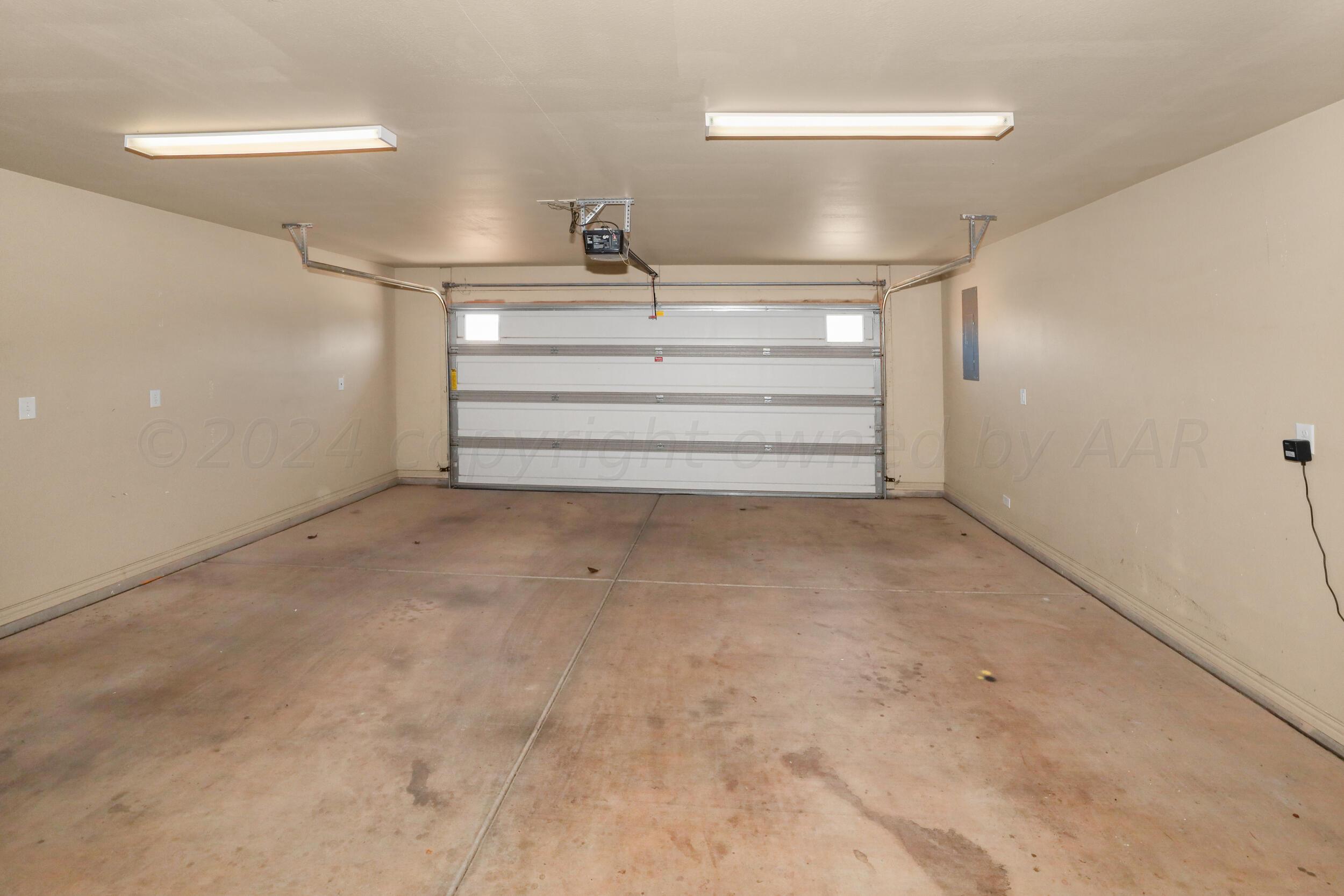 7303 Rochester Drive Amarillo, TX 79118 - Photo 34 of 38 a view of walk in closet with empty racks