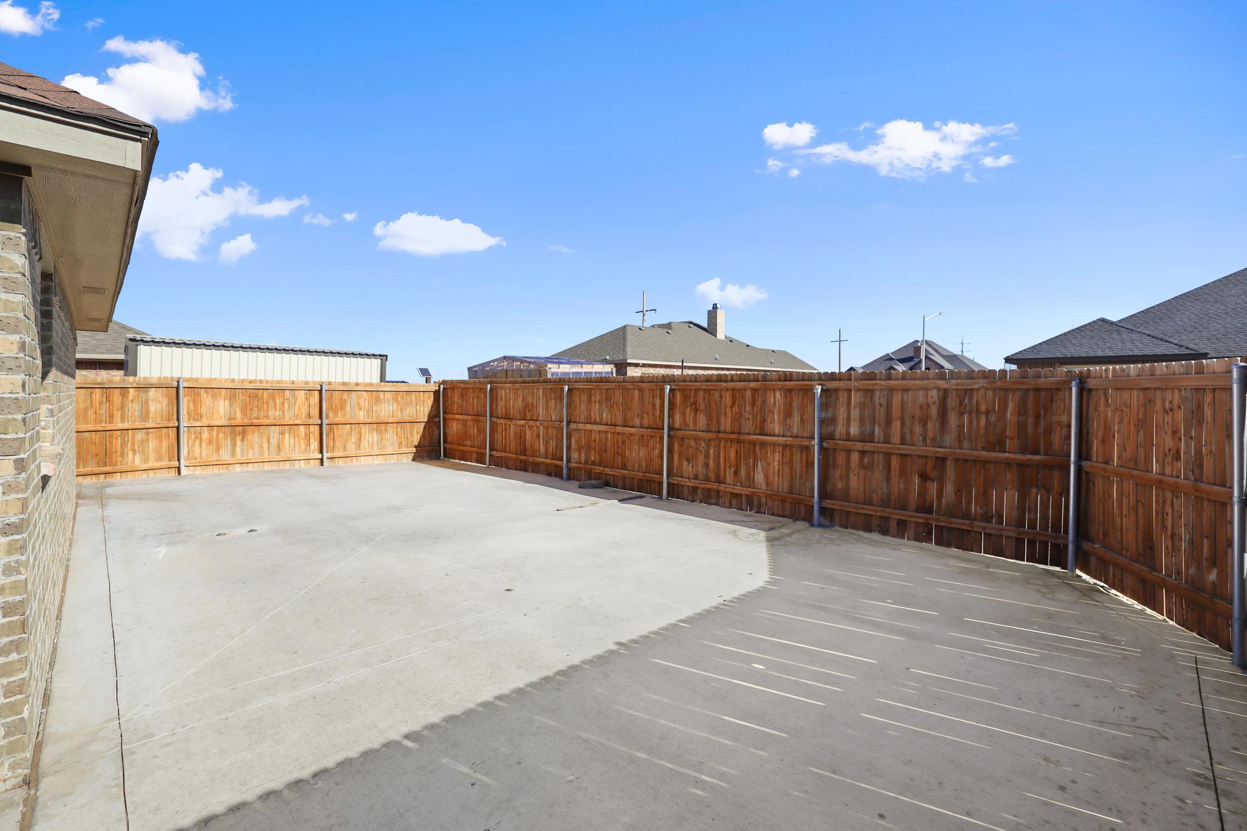 7303 Rochester Drive Amarillo, TX 79118 - Photo 36 of 38 a view of a entrance gate of a house