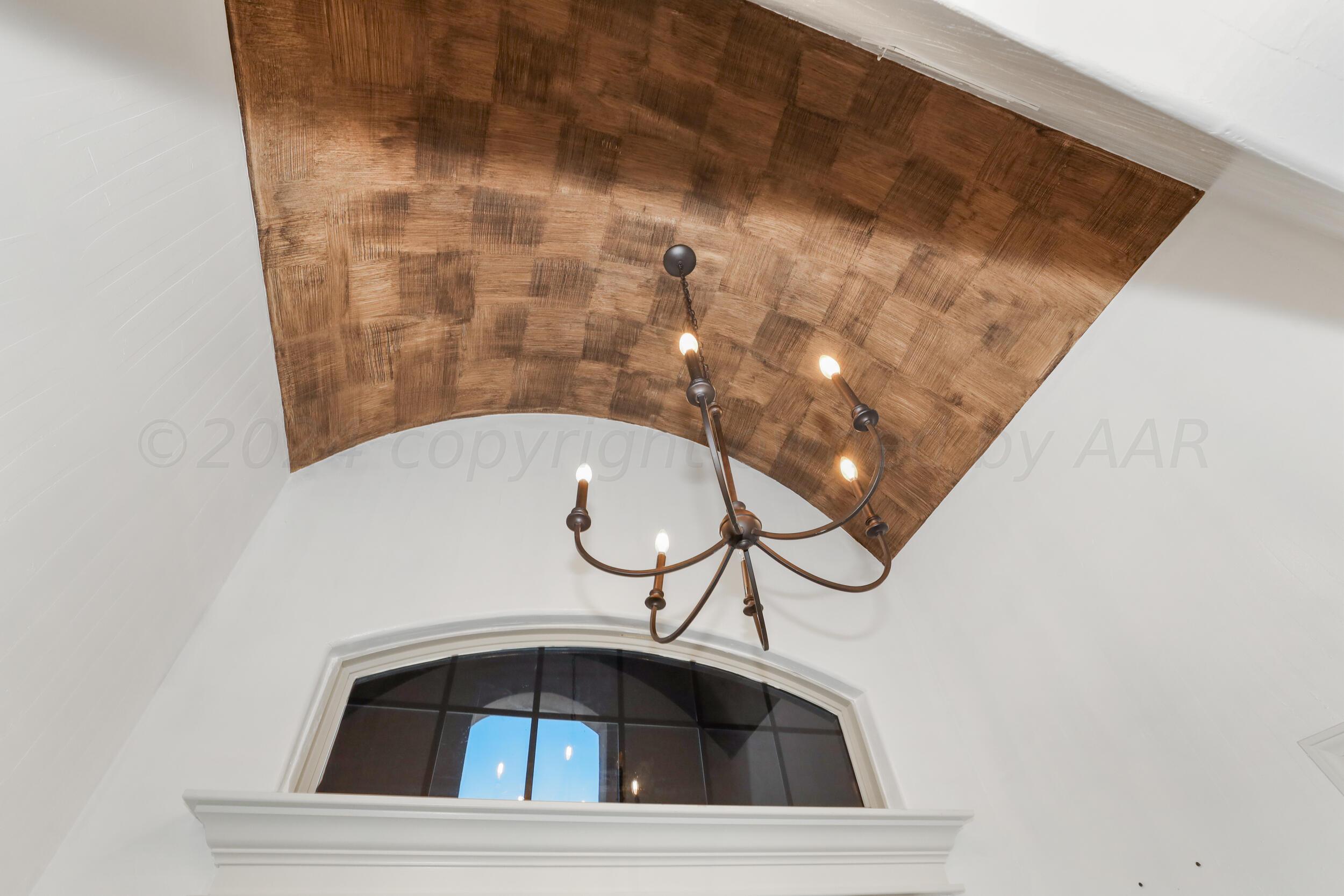 7303 Rochester Drive Amarillo, TX 79118 - Photo 6 of 38 a bathroom with a sink and mirror