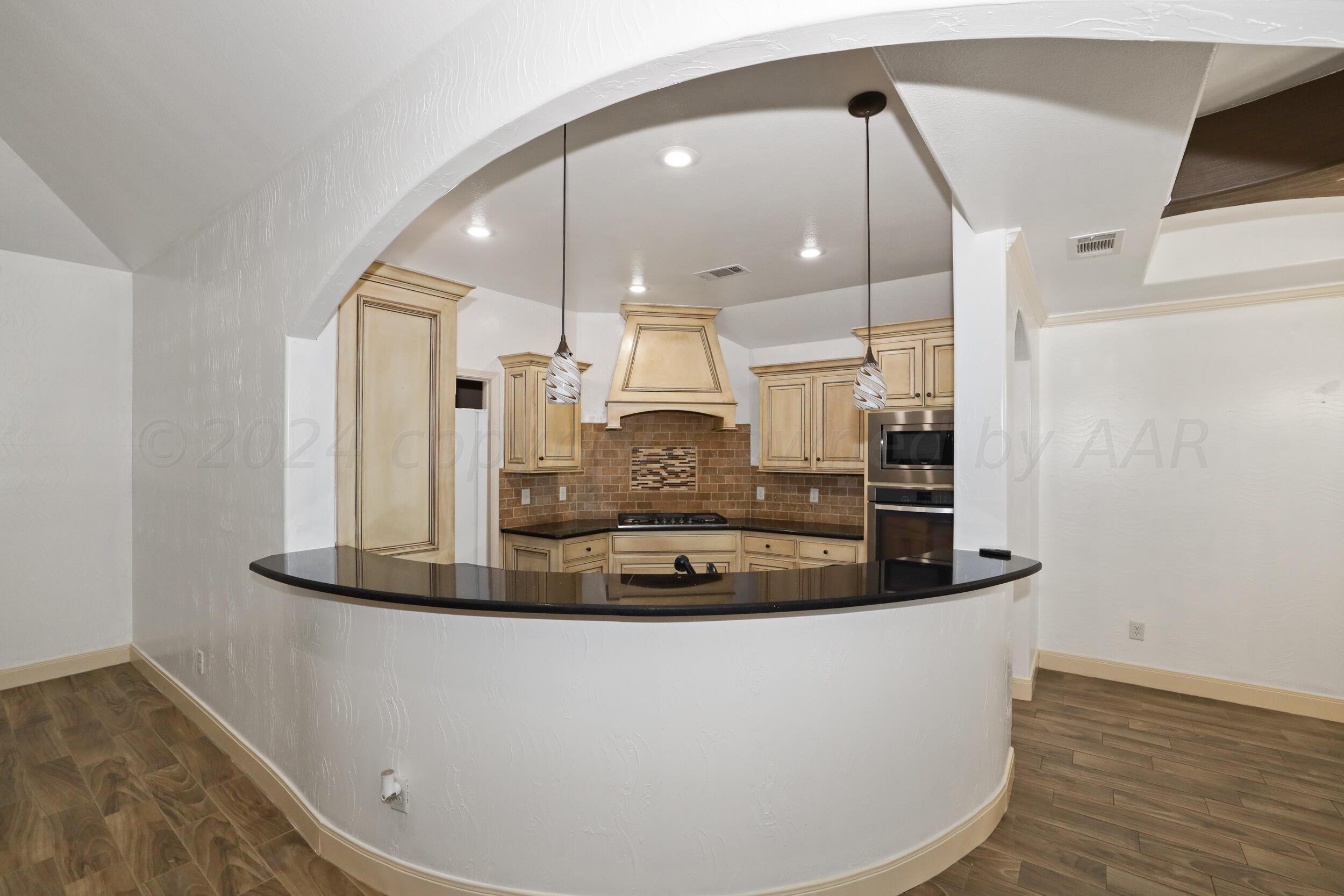 7303 Rochester Drive Amarillo, TX 79118 - Photo 8 of 38 a large room with a large window