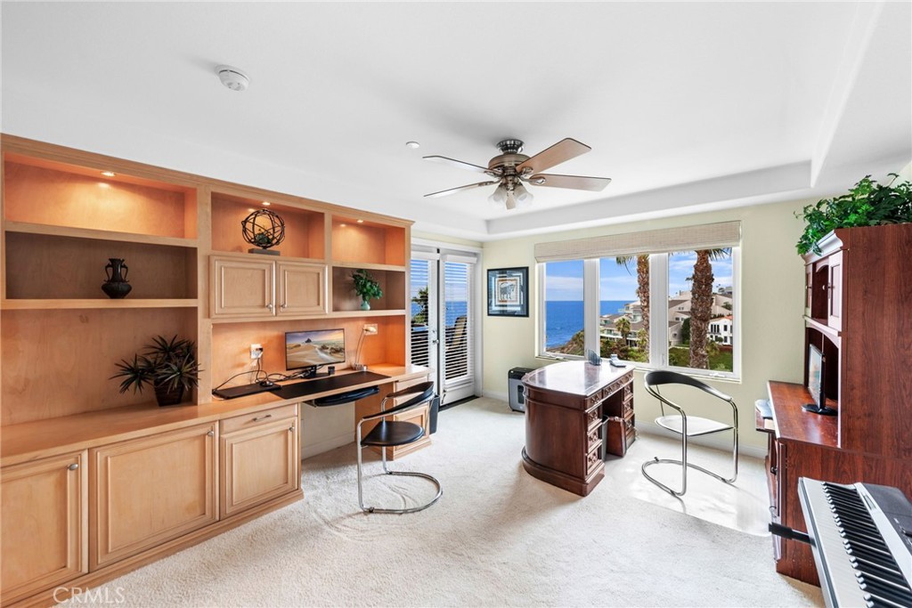 412 Arenoso Lane San Clemente, CA 92672 - Photo 19 of 23 a view of a workspace with furniture and a kitchen