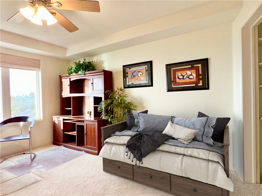 412 Arenoso Lane San Clemente, CA 92672 - Photo 20 of 23 a bedroom with a bed a desk and chair