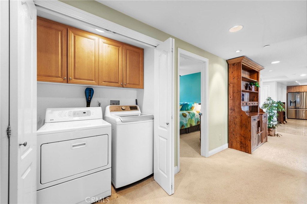 412 Arenoso Lane San Clemente, CA 92672 - Photo 22 of 23 a view of hallway with washer and dryer