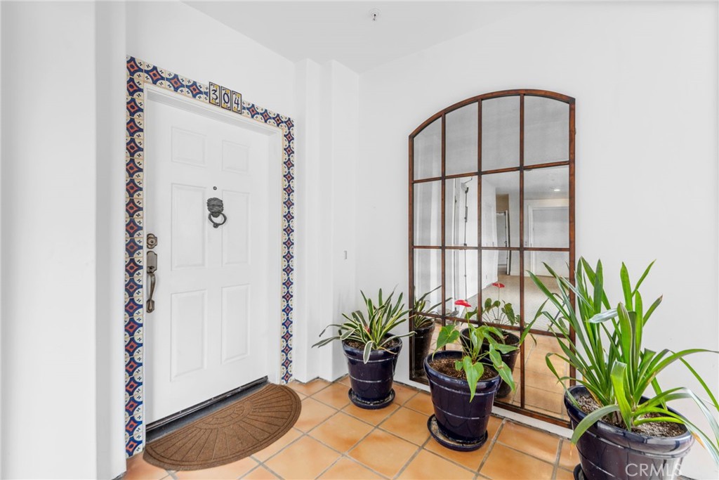 412 Arenoso Lane San Clemente, CA 92672 - Photo 4 of 23 a glass vase with flowers sitting on a table