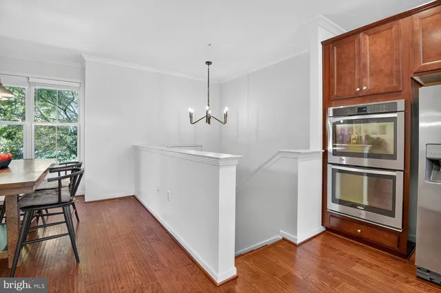 a view of a room with furniture window and wooden floor