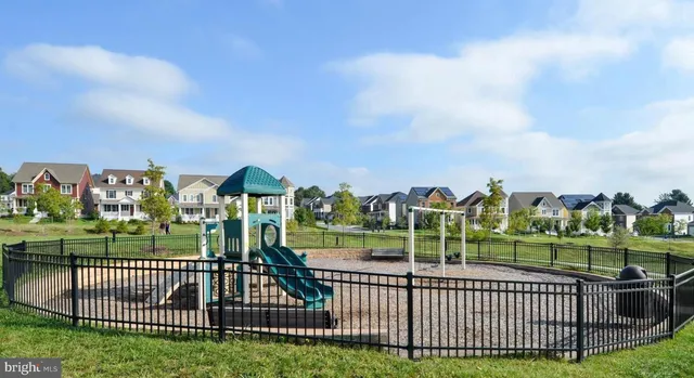 a view of a wrought iron fences in front of house