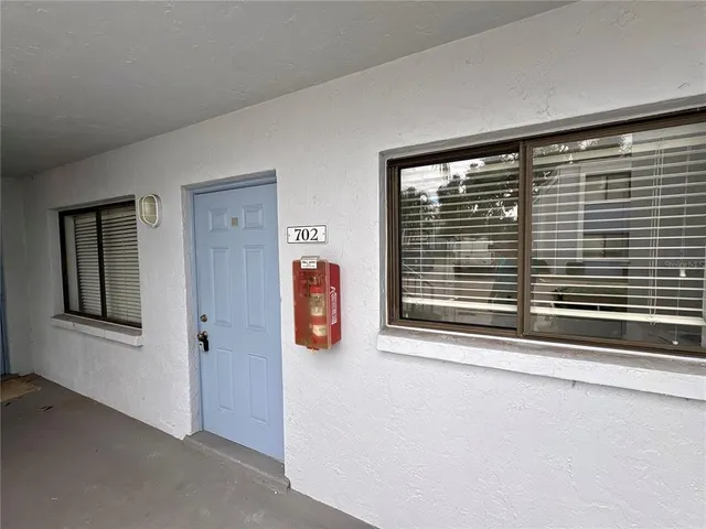 a view of a room that has a window in it