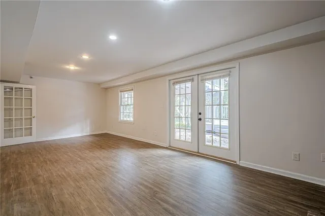 a view of deck with wooden floor and fence