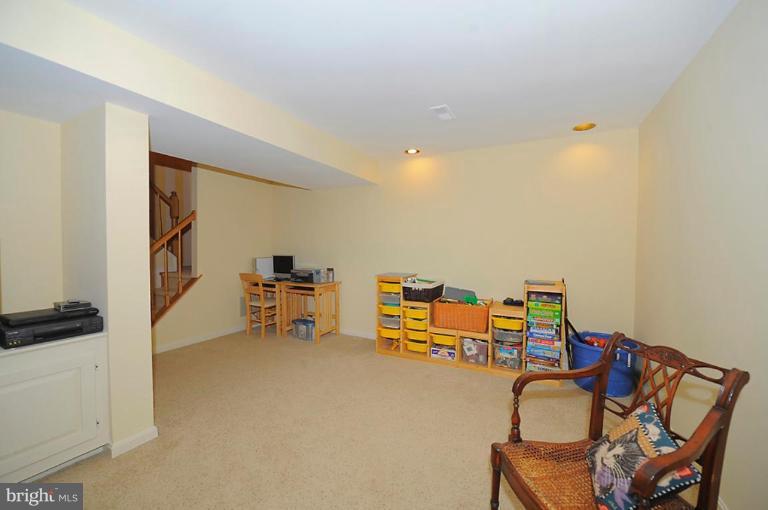 6583 Forsythia Street Springfield, VA 22150 - Photo 26 of 28 a view of a room with chairs
