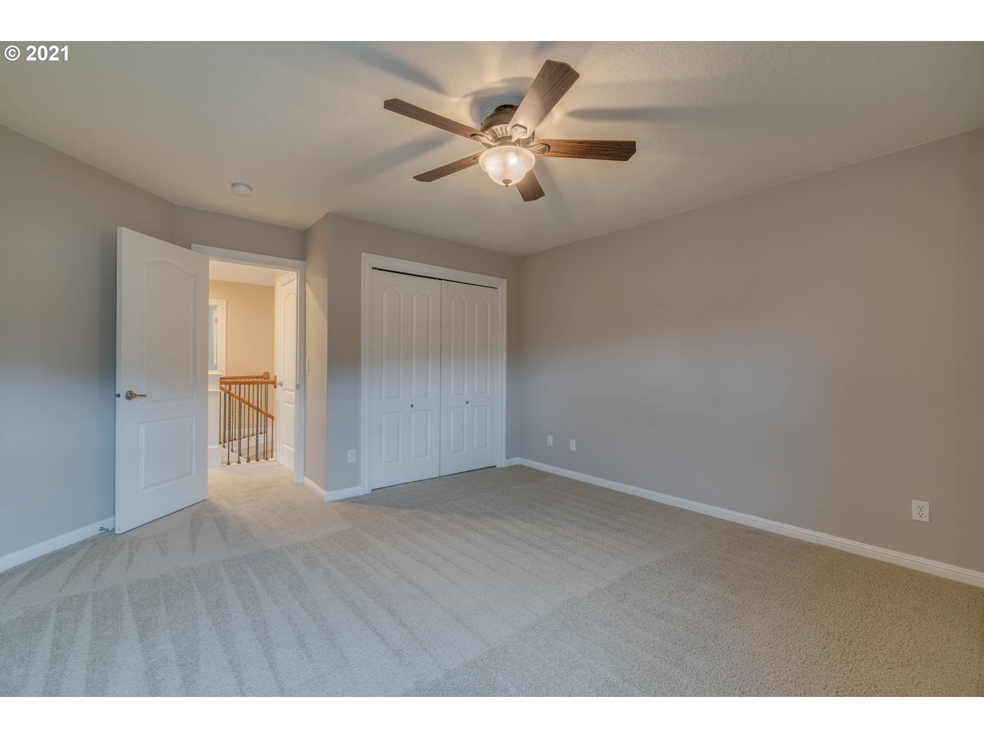 3113 Northwest 30th Circle Camas, WA 98607 - Photo 21 of 32 a view of an empty room with a ceiling fan