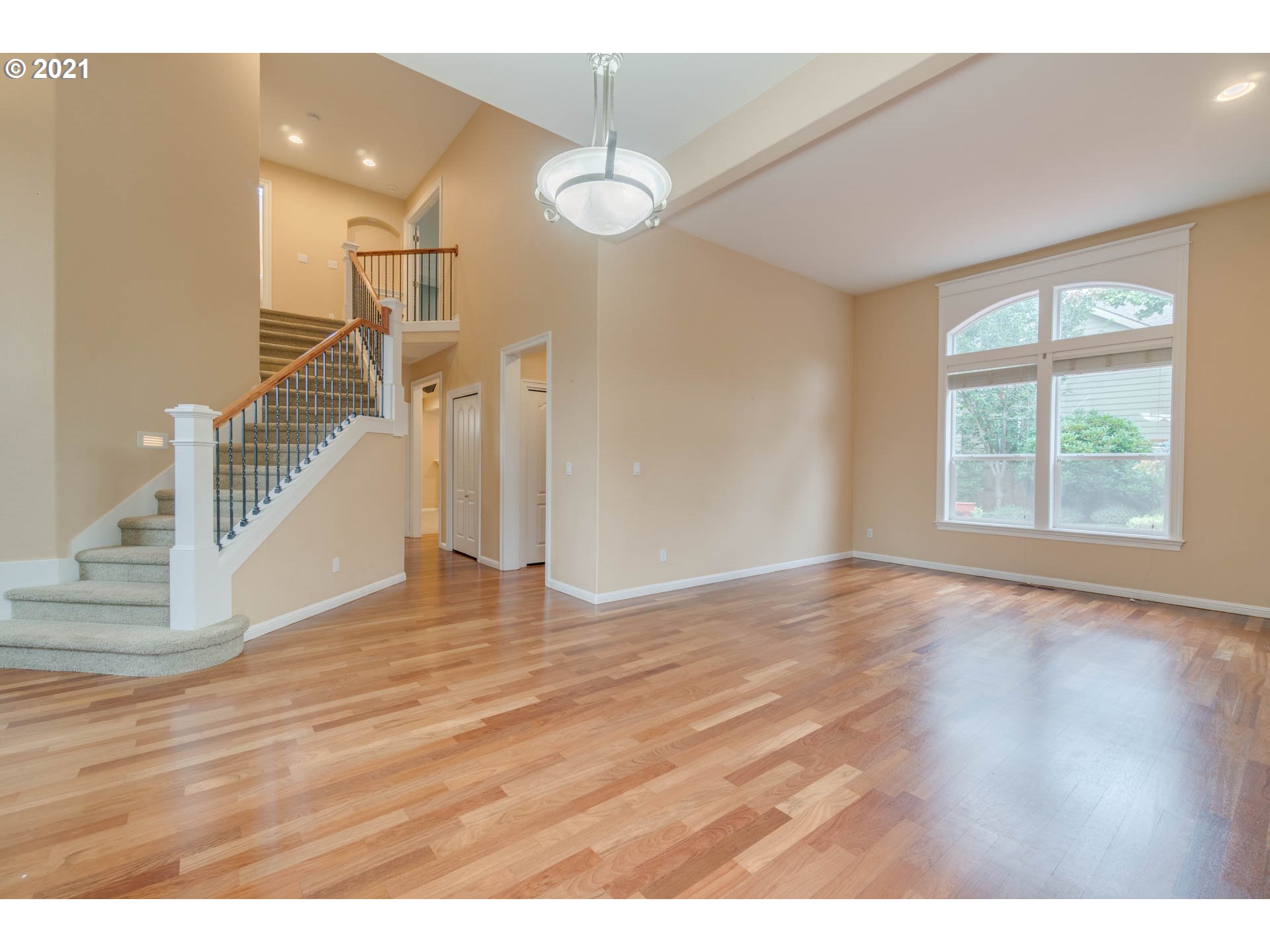 3113 Northwest 30th Circle Camas, WA 98607 - Photo 26 of 32 a view of an empty room with wooden floor and a window