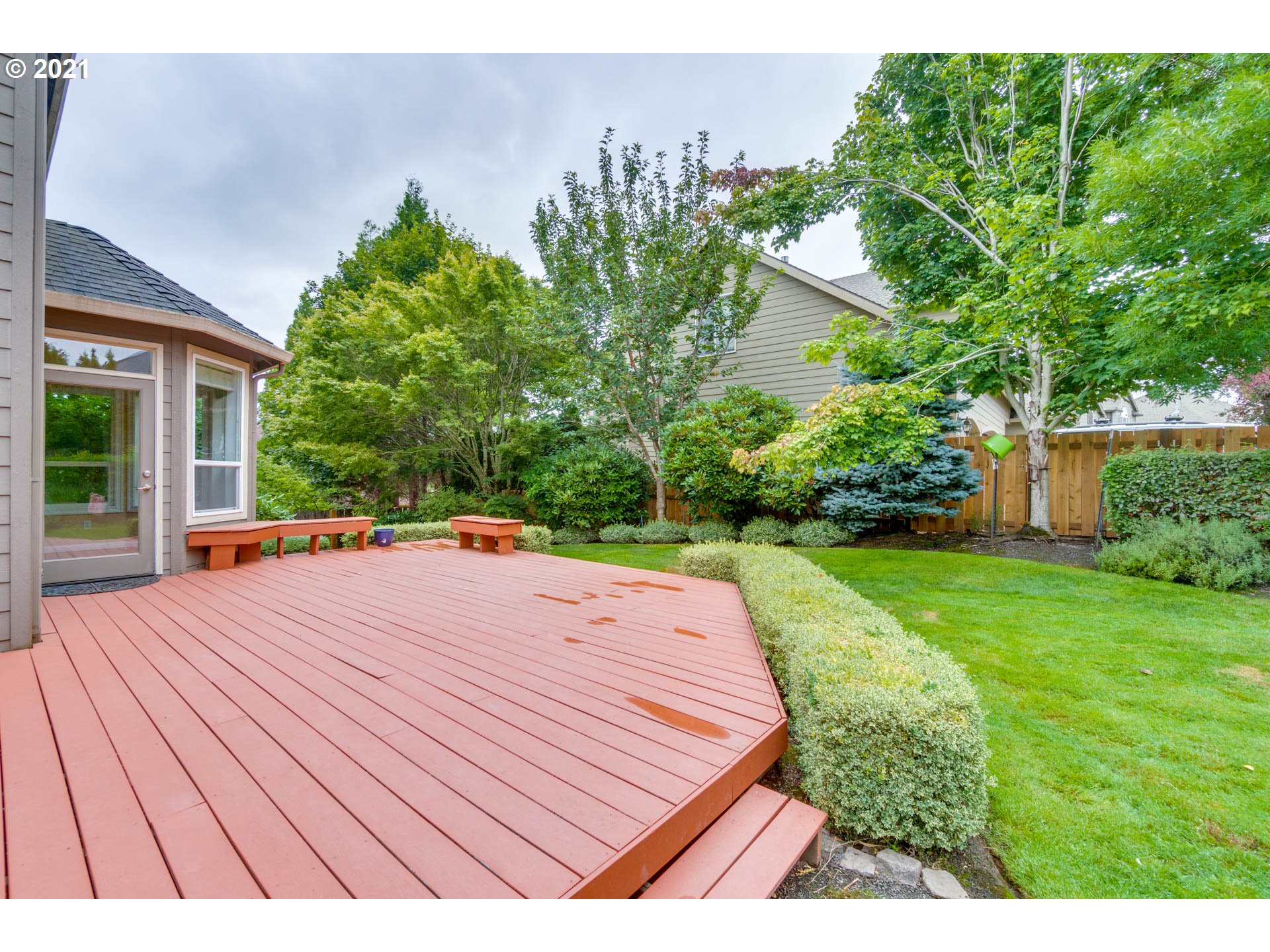 3113 Northwest 30th Circle Camas, WA 98607 - Photo 30 of 32 a wooden deck with trees in front of it
