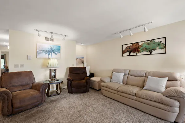 a living room with furniture and a couch