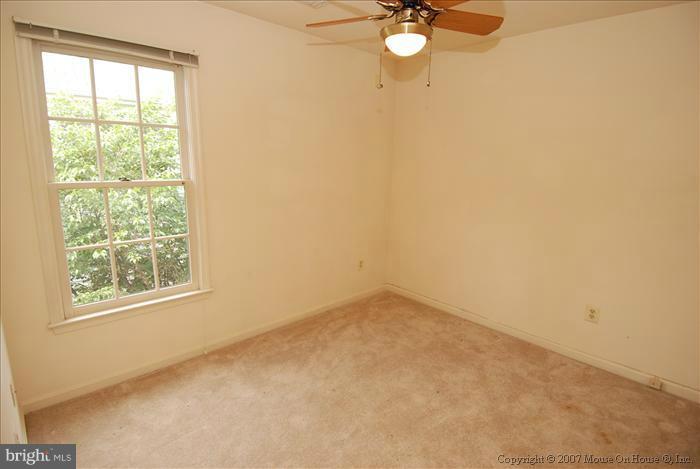 6601 Forsythia Street Springfield, VA 22150 - Photo 12 of 26 an empty room with a window