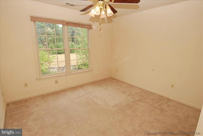 6601 Forsythia Street Springfield, VA 22150 - Photo 15 of 26 an empty room with a window