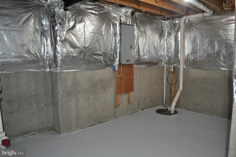 6601 Forsythia Street Springfield, VA 22150 - Photo 8 of 26 a view of water heater room