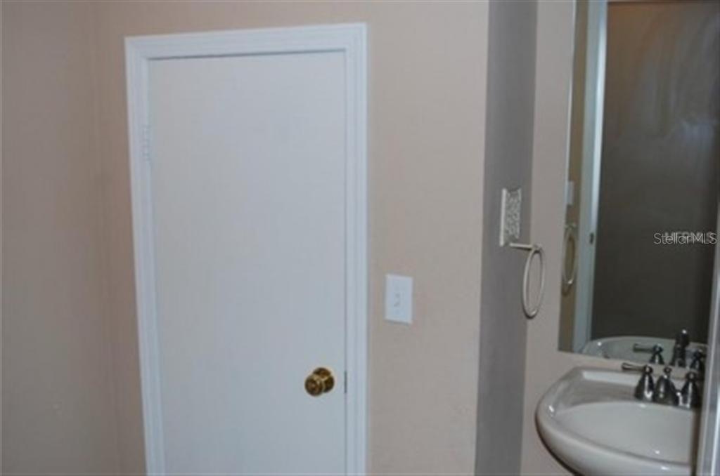 3419 Dragon View Court Valrico, FL 33594 - Photo 11 of 17 a bathroom with a sink and a mirror
