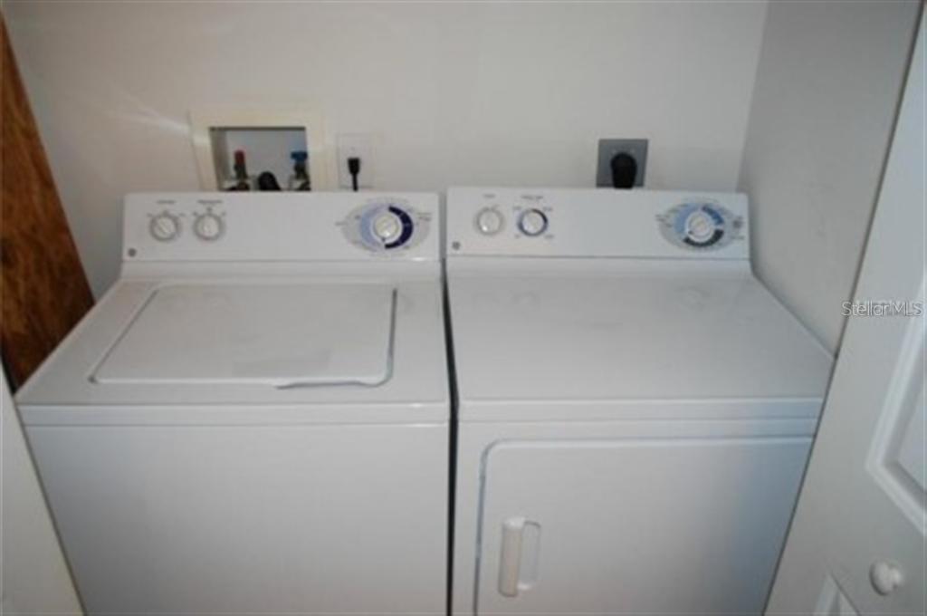 3419 Dragon View Court Valrico, FL 33594 - Photo 7 of 17 a utility room with dryer and washer
