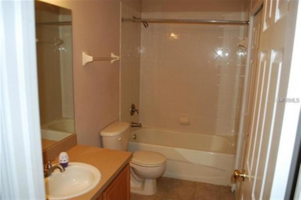 3419 Dragon View Court Valrico, FL 33594 - Photo 8 of 17 a bathroom with a sink toilet and shower