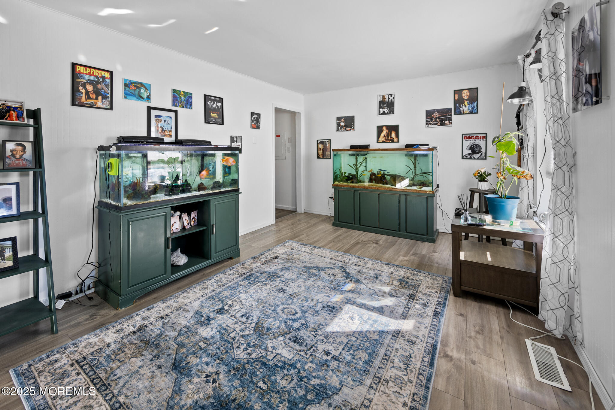 14 Georgetown Boulevard Barnegat, NJ 08005 - Photo 4 of 39 a living room with furniture and painting on the wall