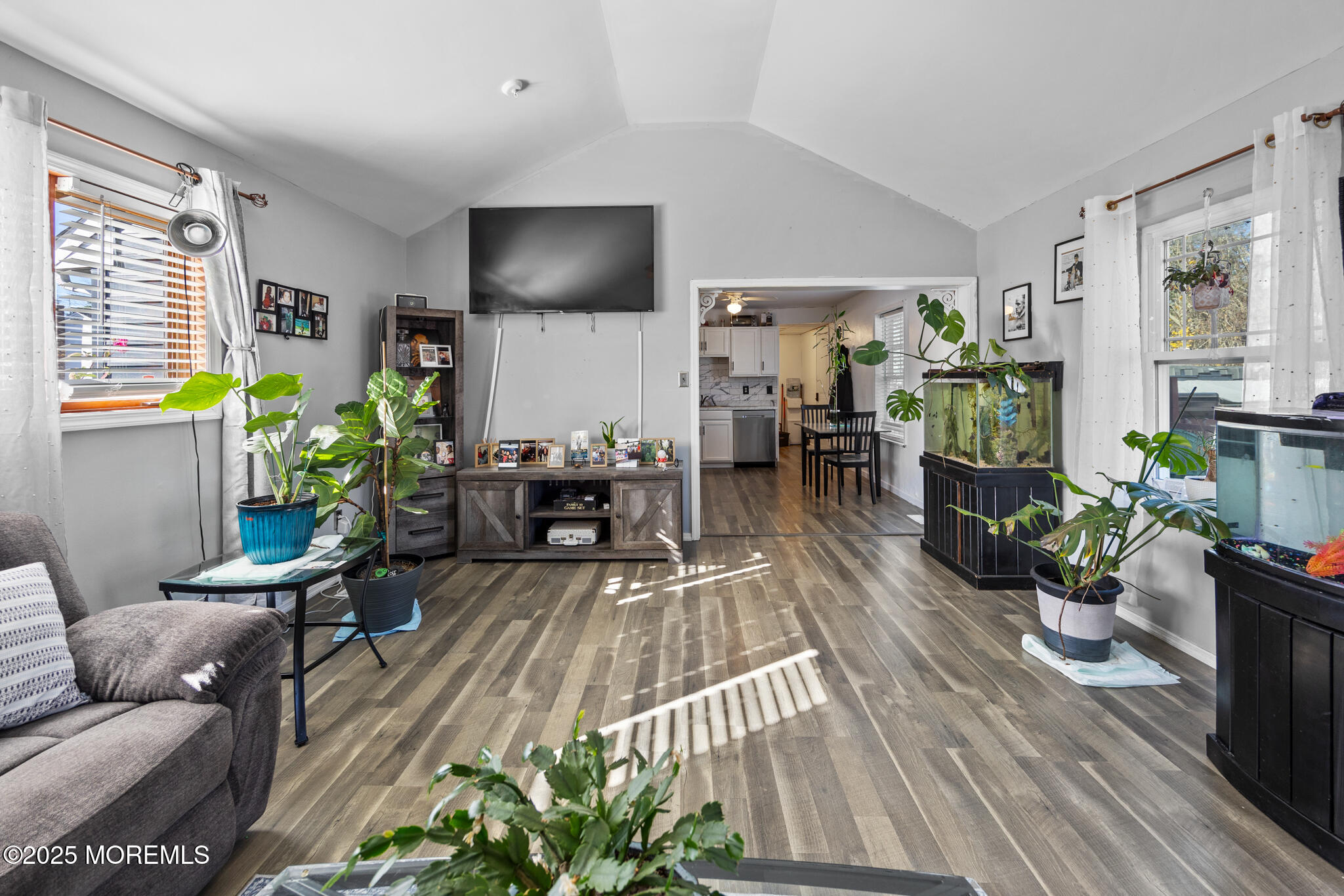 14 Georgetown Boulevard Barnegat, NJ 08005 - Photo 10 of 39 a living room with furniture and a flat screen tv