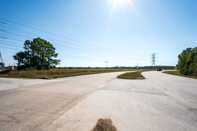 a view of a swimming pool and an outdoor space