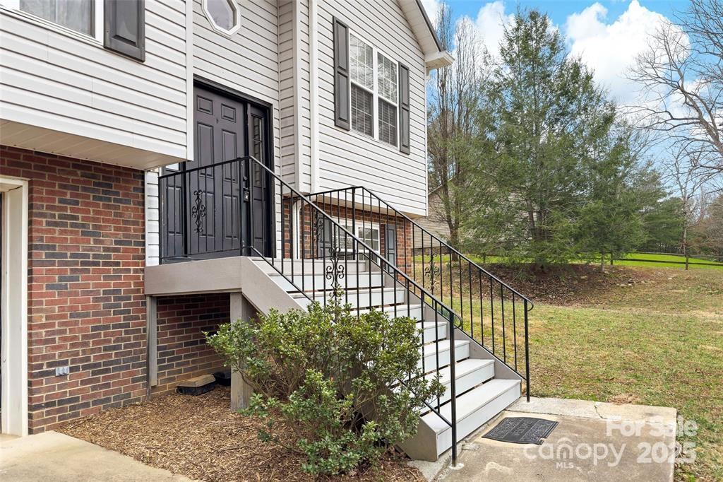 2691 Laurel Point Drive Nebo, NC 28761 - Photo 10 of 44 a front view of a house with a yard