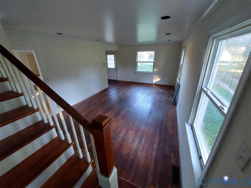 2903 Hampton Hall Road Callao, VA 22435 - Photo 4 of 12 Staircase featuring wood finished floors and crown