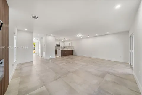 a view of kitchen and a sink