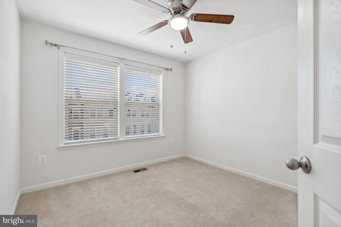 42219 Dean Chapel Square Chantilly, VA 20152 - Photo 13 of 21 a view of an empty room with a window